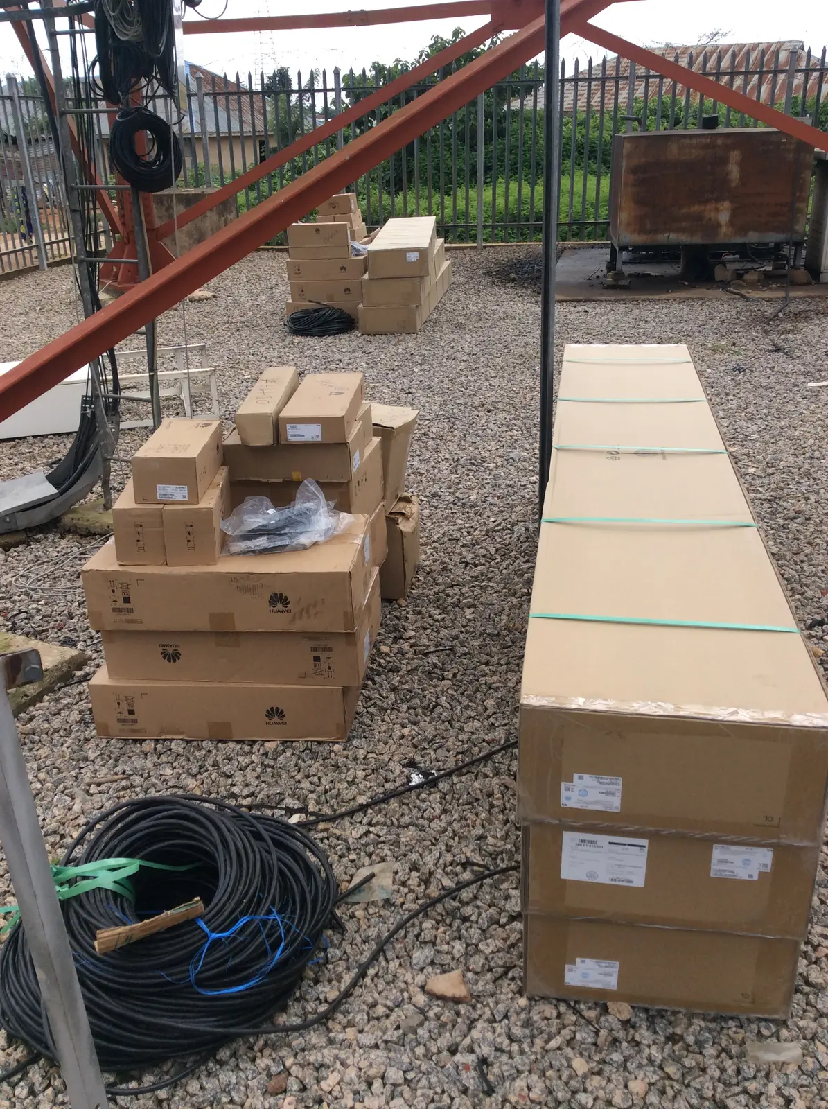 Packaged telecommunications equipment and installation materials at a site
