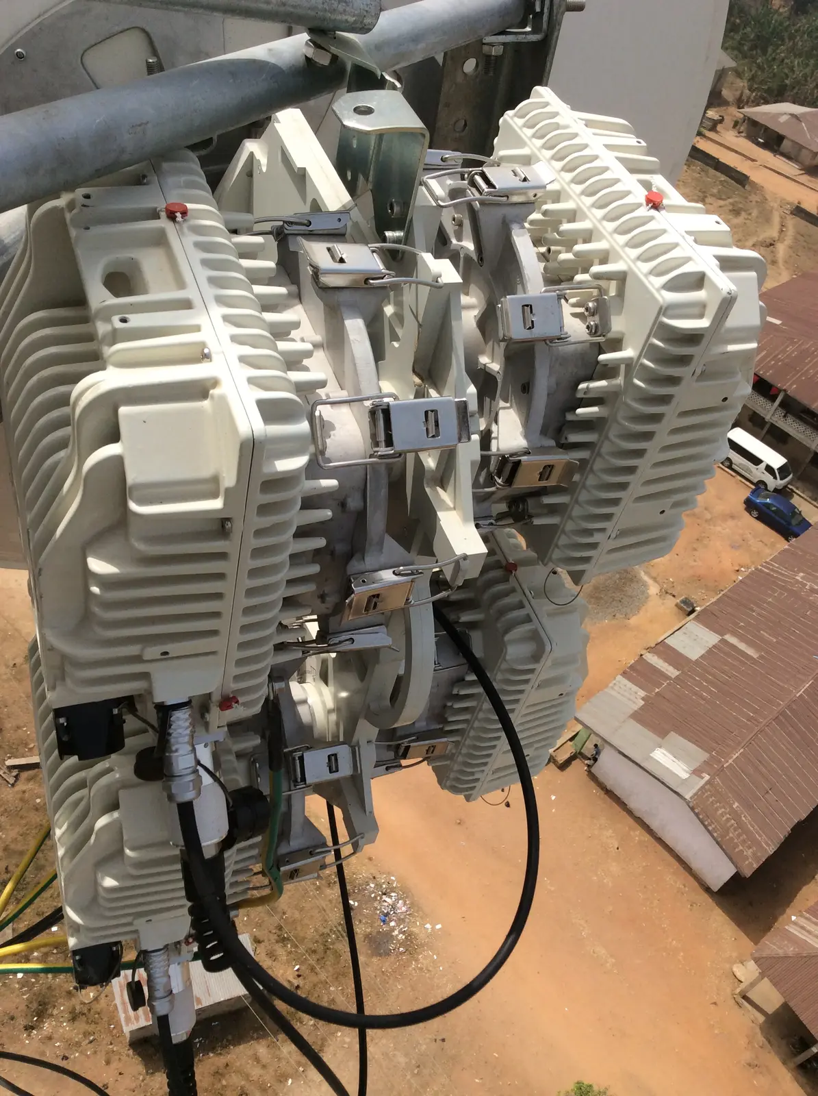 Close view of outdoor radio transmission equipment installed at height