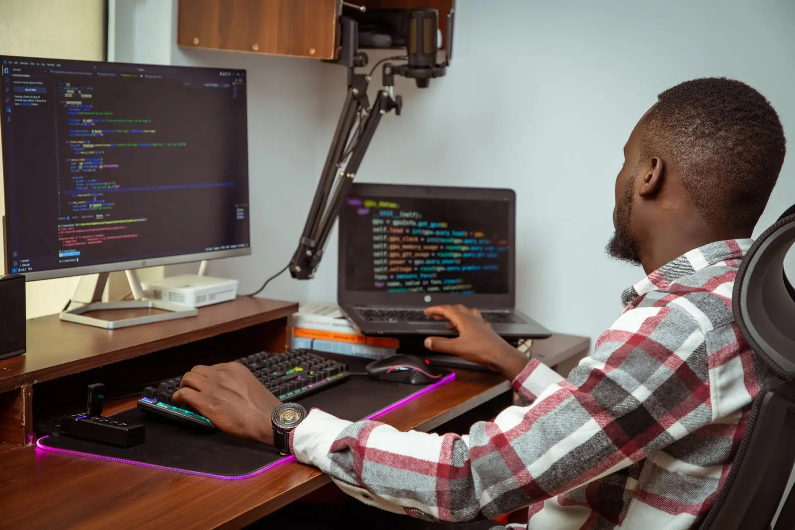 African software developer working across desktop and laptop systems